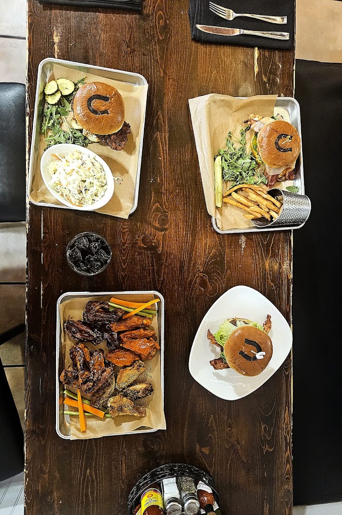 A table spread with four plates from above